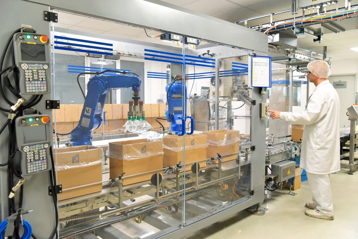 Automated packaging line representing an industrial manufacturing client in a Strategic Benefits Advisors retirement plan case study.