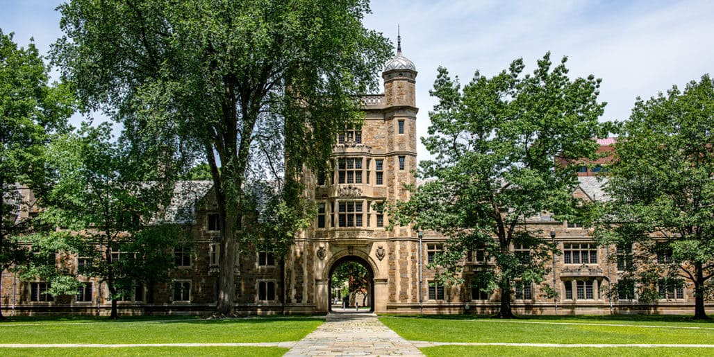 A University campus with a collegiate gothic-style building, representing a Strategic Benefits Advisors client in a 403(b) compliance consulting case study.
